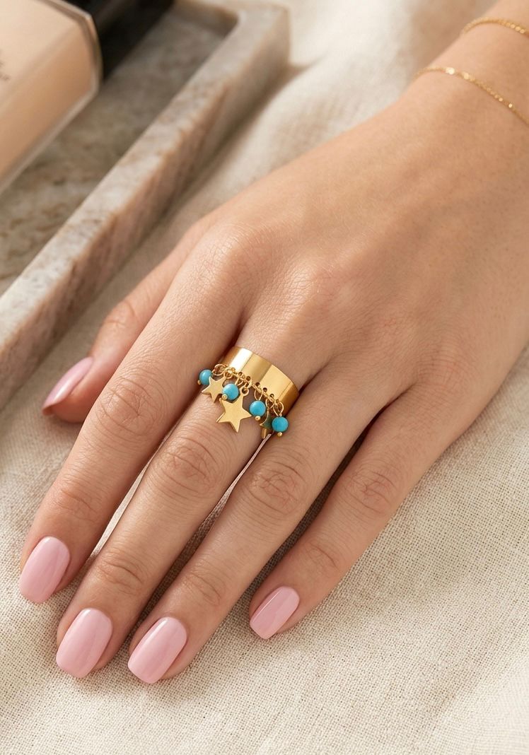 Anillo estrellas colgantes